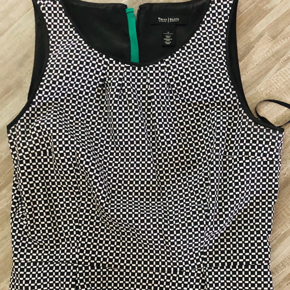 White House/Black Market peplum top. Great shirt!